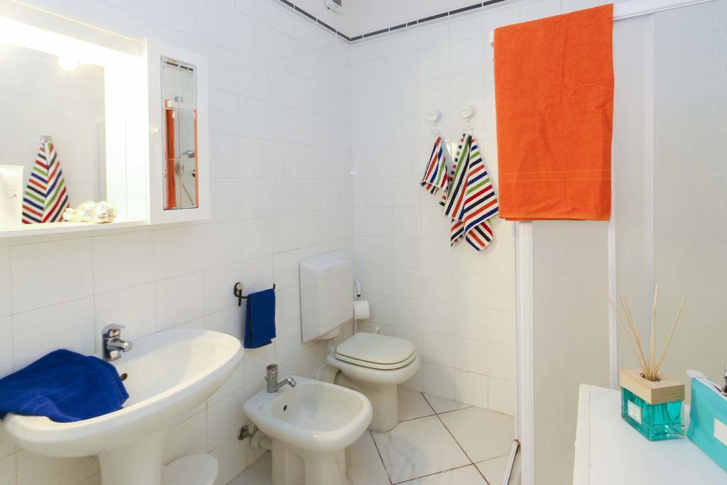 Il Porto Trilocale Nr.7 Apartment ปอร์โตอัซซูร์โร ภายนอก รูปภาพ