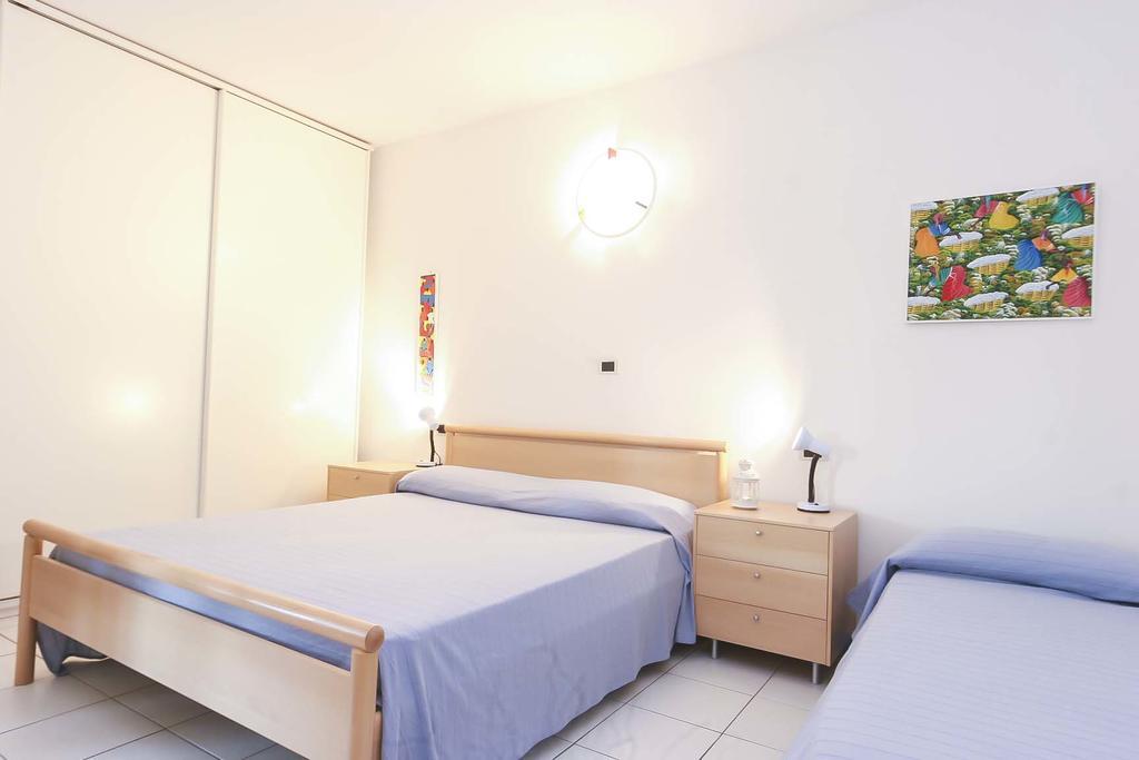 Il Porto Trilocale Nr.7 Apartment ปอร์โตอัซซูร์โร ภายนอก รูปภาพ