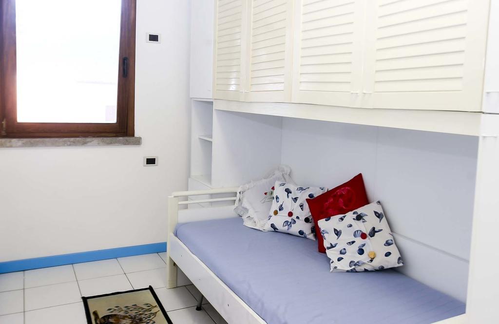 Il Porto Trilocale Nr.7 Apartment ปอร์โตอัซซูร์โร ภายนอก รูปภาพ