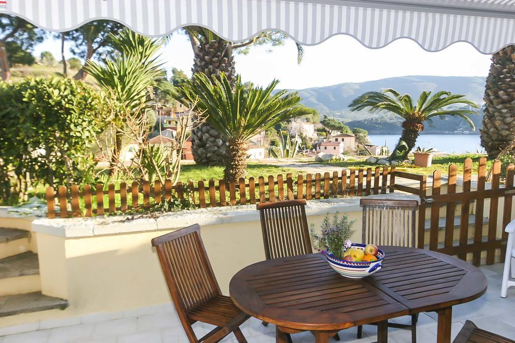 Il Porto Trilocale Nr.7 Apartment ปอร์โตอัซซูร์โร ภายนอก รูปภาพ