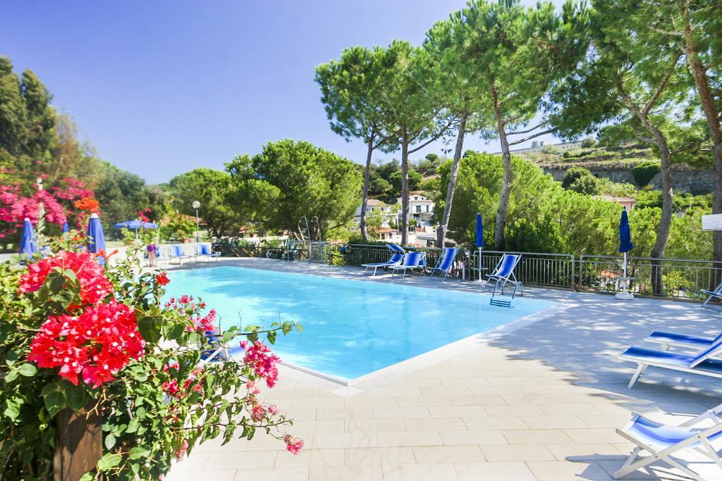 Il Porto Trilocale Nr.7 Apartment ปอร์โตอัซซูร์โร ภายนอก รูปภาพ